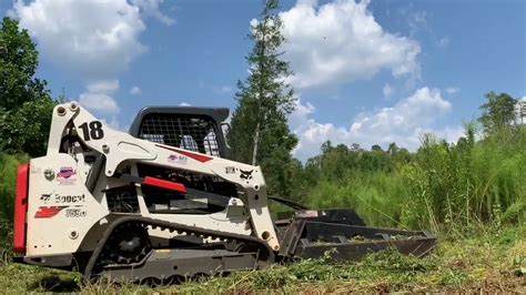 bobcat skid steer with brush hog|brush hogging with skid steer.